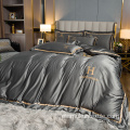 Juego de cama de seda lavada sólida con bordado de logotipo de lujo